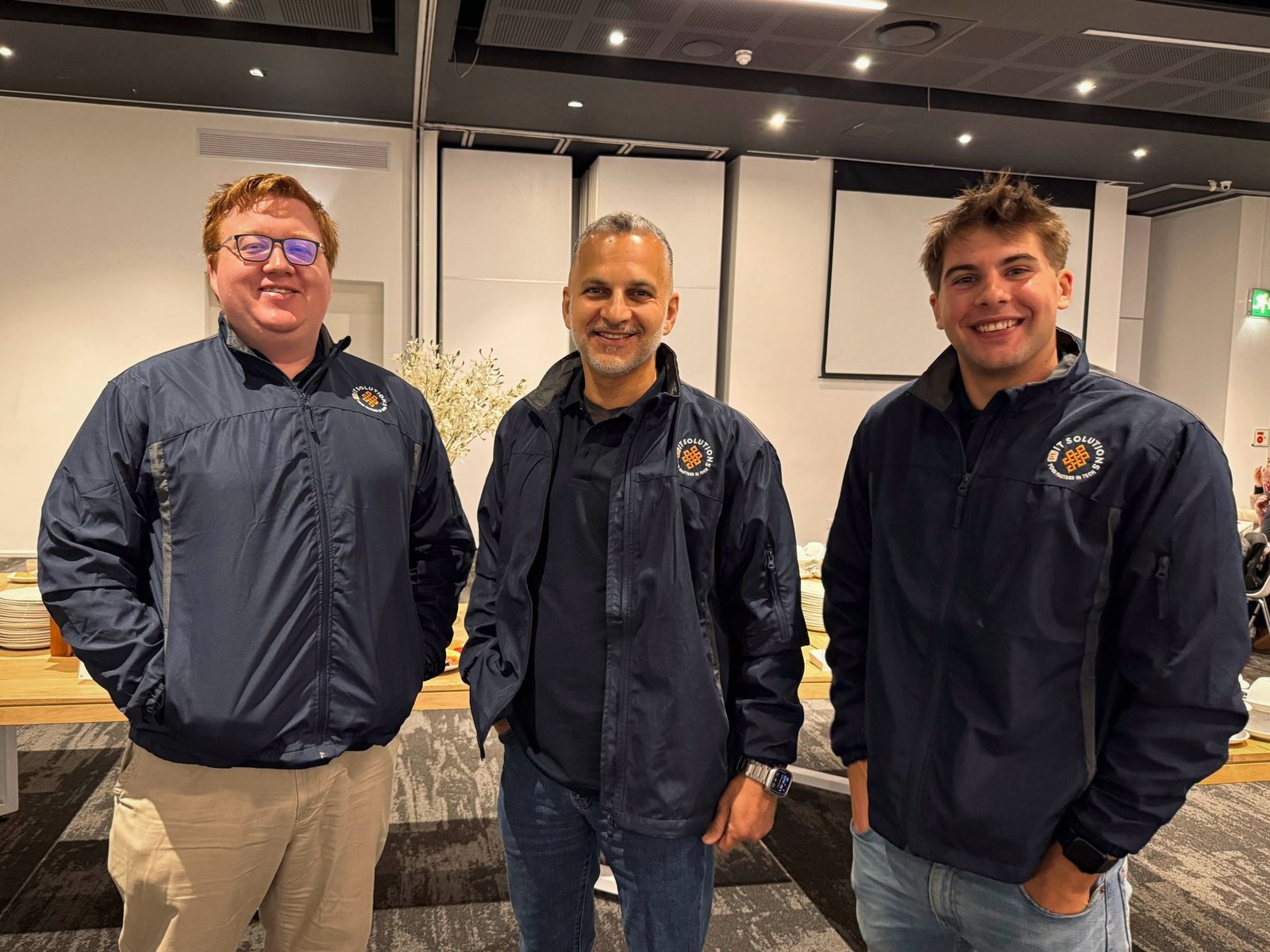 The F1 IT Solutions team: Leo Liebenberg with Reza and Christiaan
